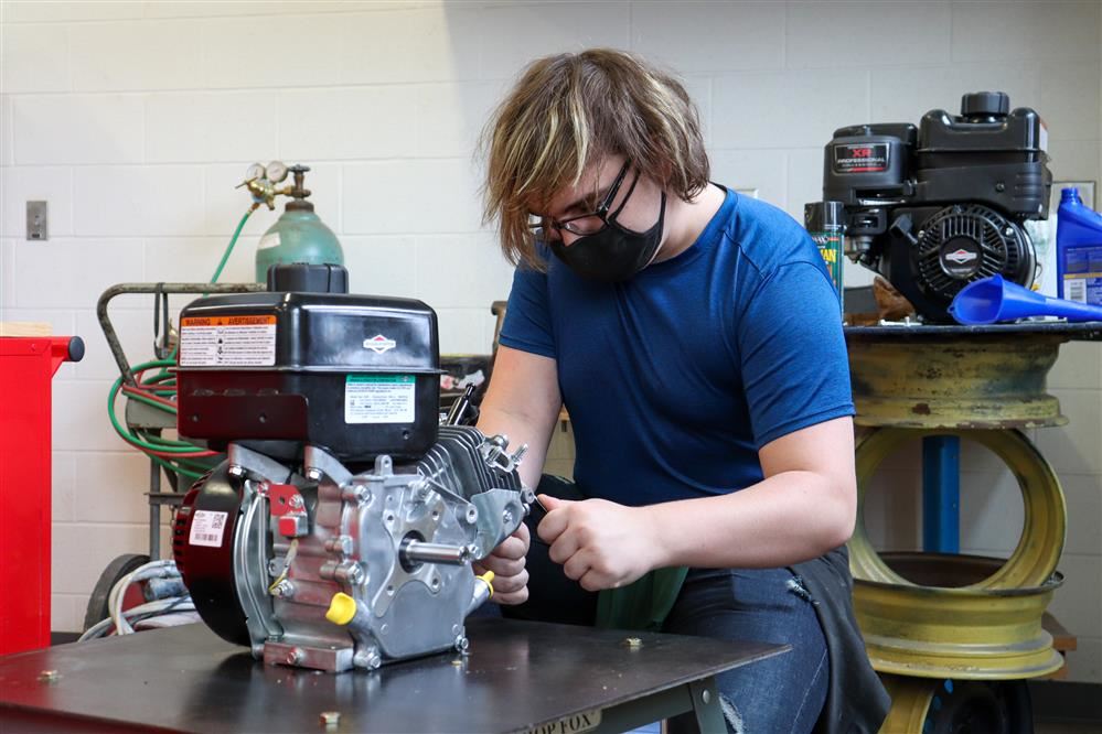 Student hard at work in our small engines class.