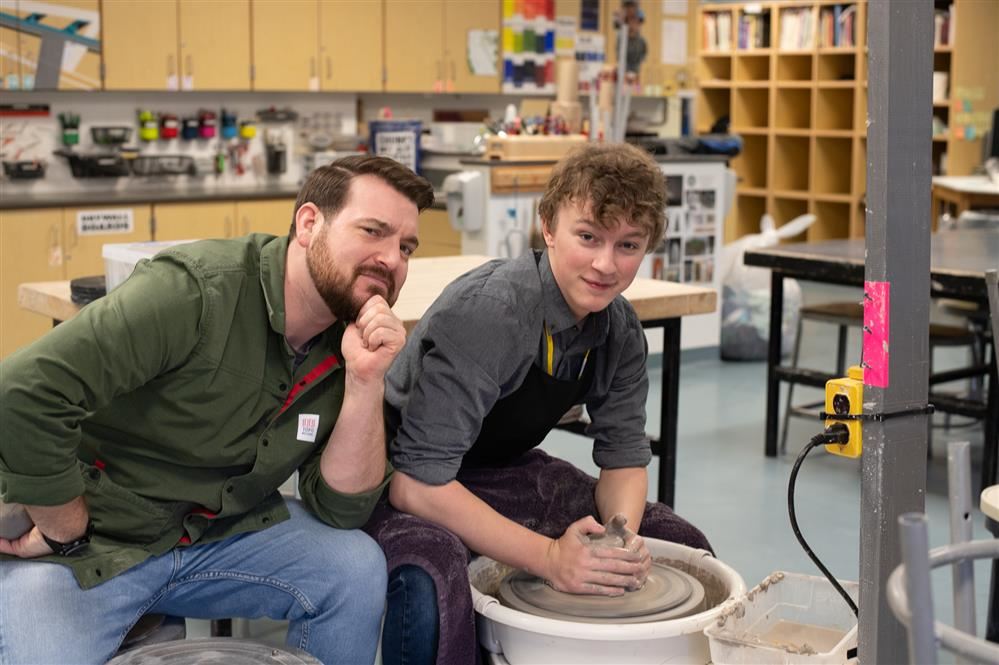 Student and teacher swapping roles during senior swap day!