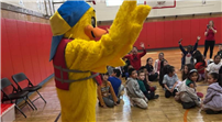 Stewie the Duck and his friend Sarah Caro, from the Stew Leonard III Water Safety Foundation, spoke to all Northwest’s students about tips to stay safe around water this summer. thumbnail266314