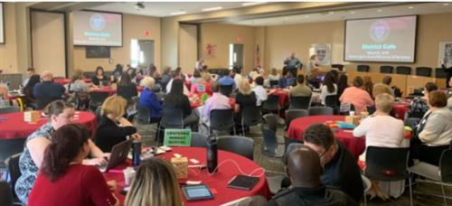 A staff meeting at AESD 