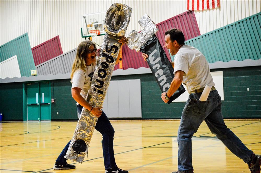 BISD staff having fun at an assembly 