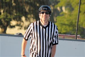 Mr. Harris reffing roller hockey 