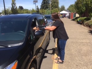 Chromebook handed through car window