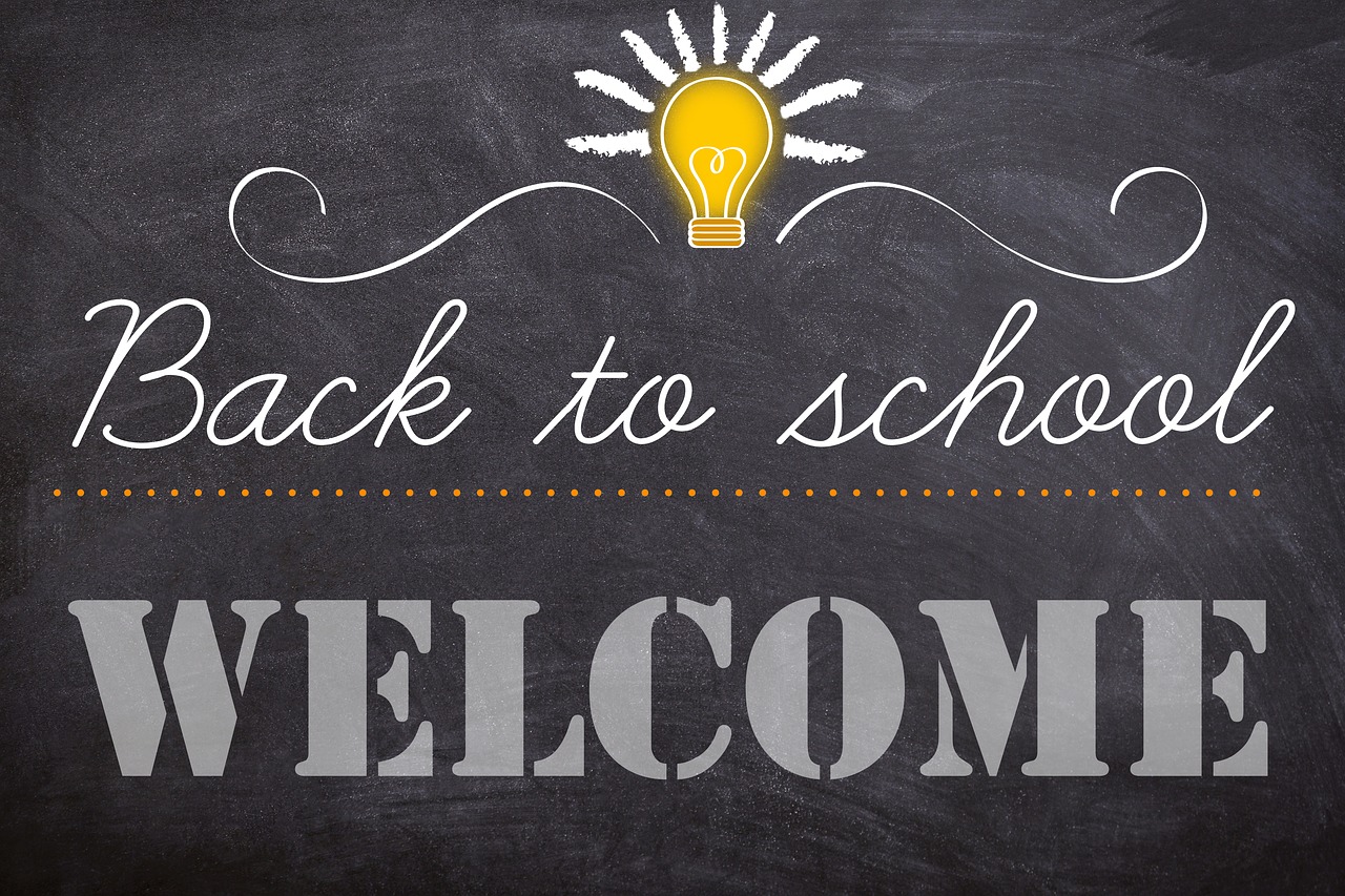 back to school welcome written on a chalkboard