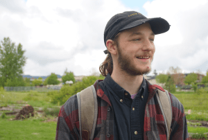 Dylan brown stands outside of Kalapuya High School