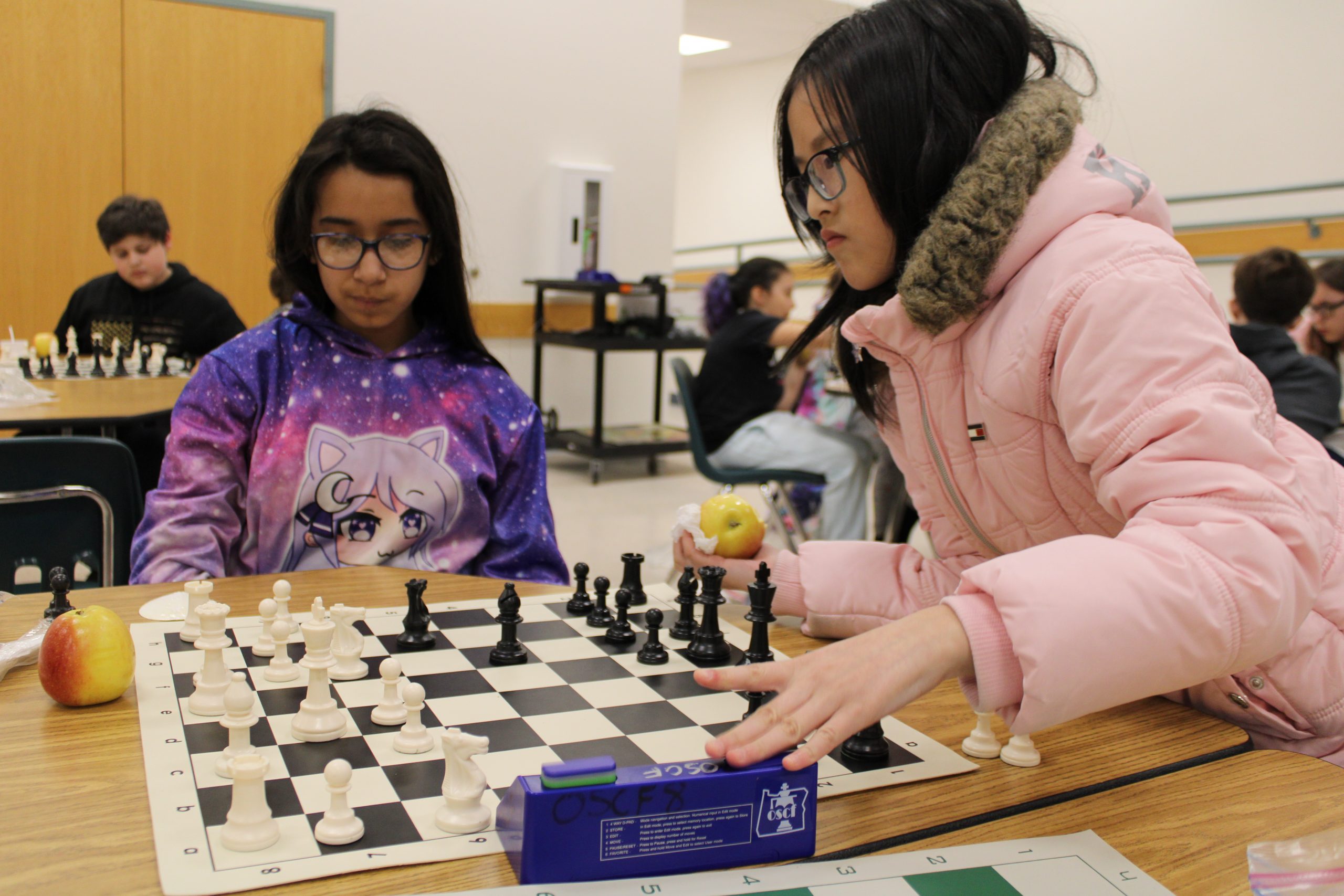 Two Prairie Mountain students play chess at Prairie Mountain.