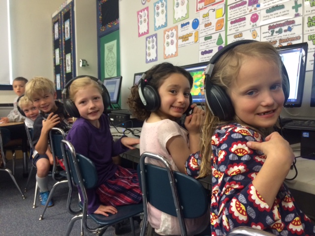 elementary students at computers