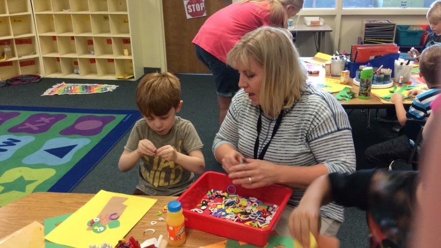 a parent helping a student
