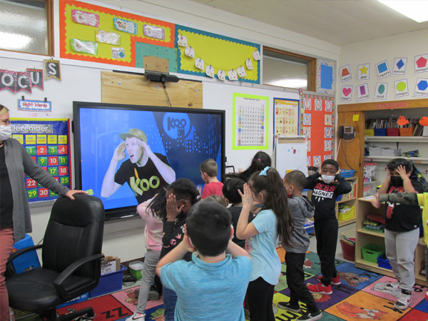 SchoolTechnology Students Interacting with Online Educator