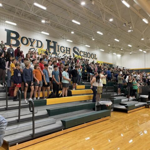 Photo of students in the stands during a pep rally