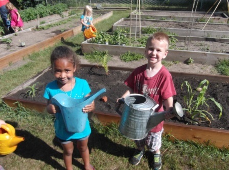 2 children in a garden