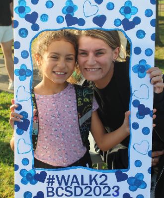  Parent and student walk to school