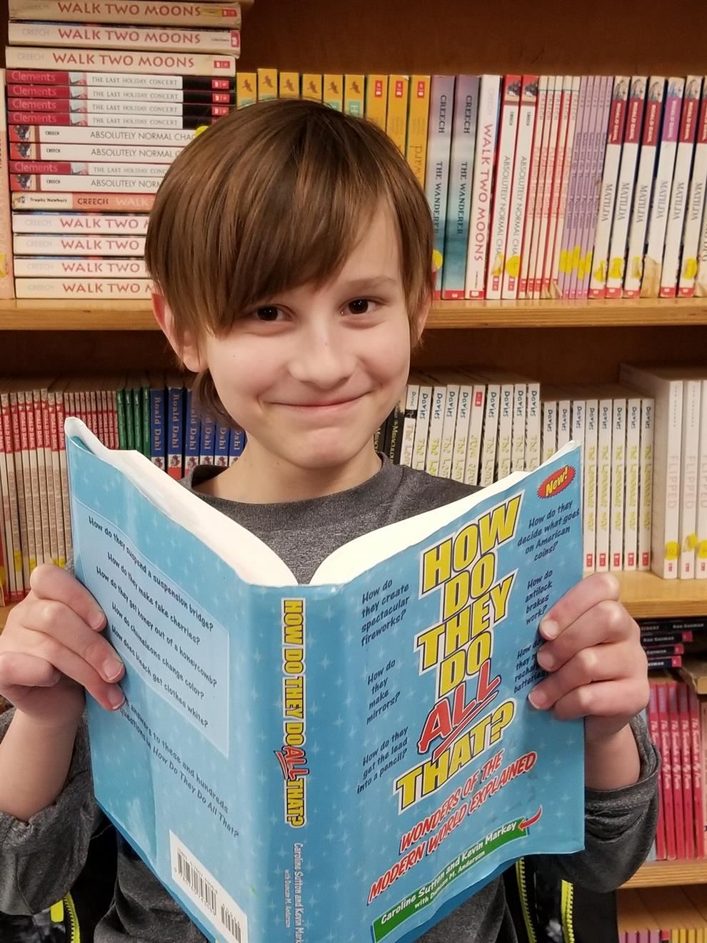 Fourth-grade student taking the TEDx stage