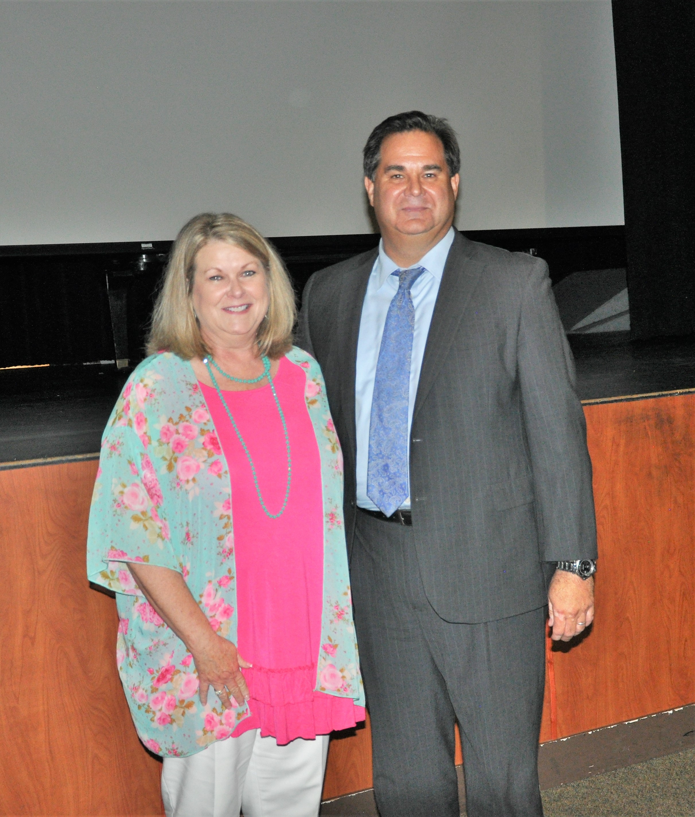 image of Mrs. Jeffers accepting her award from Mr. Welch