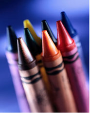 Mulit colored crayons in a group.