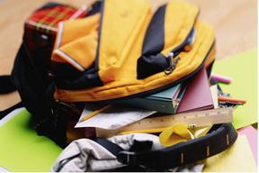 Book Bag filled with books and school supplies.