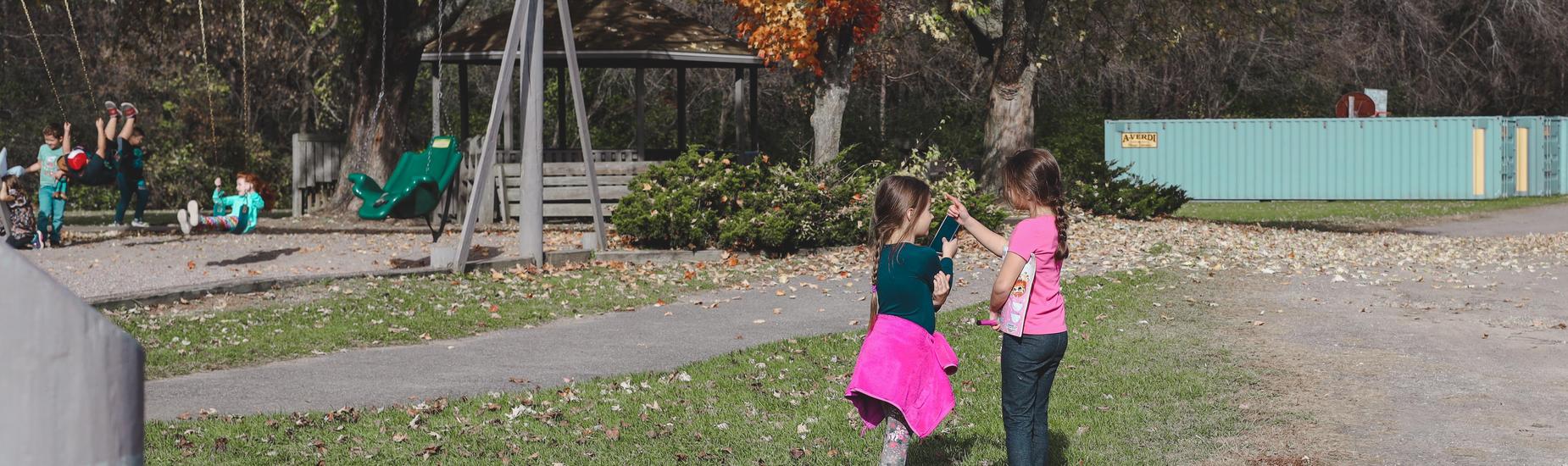 students on playground; friends