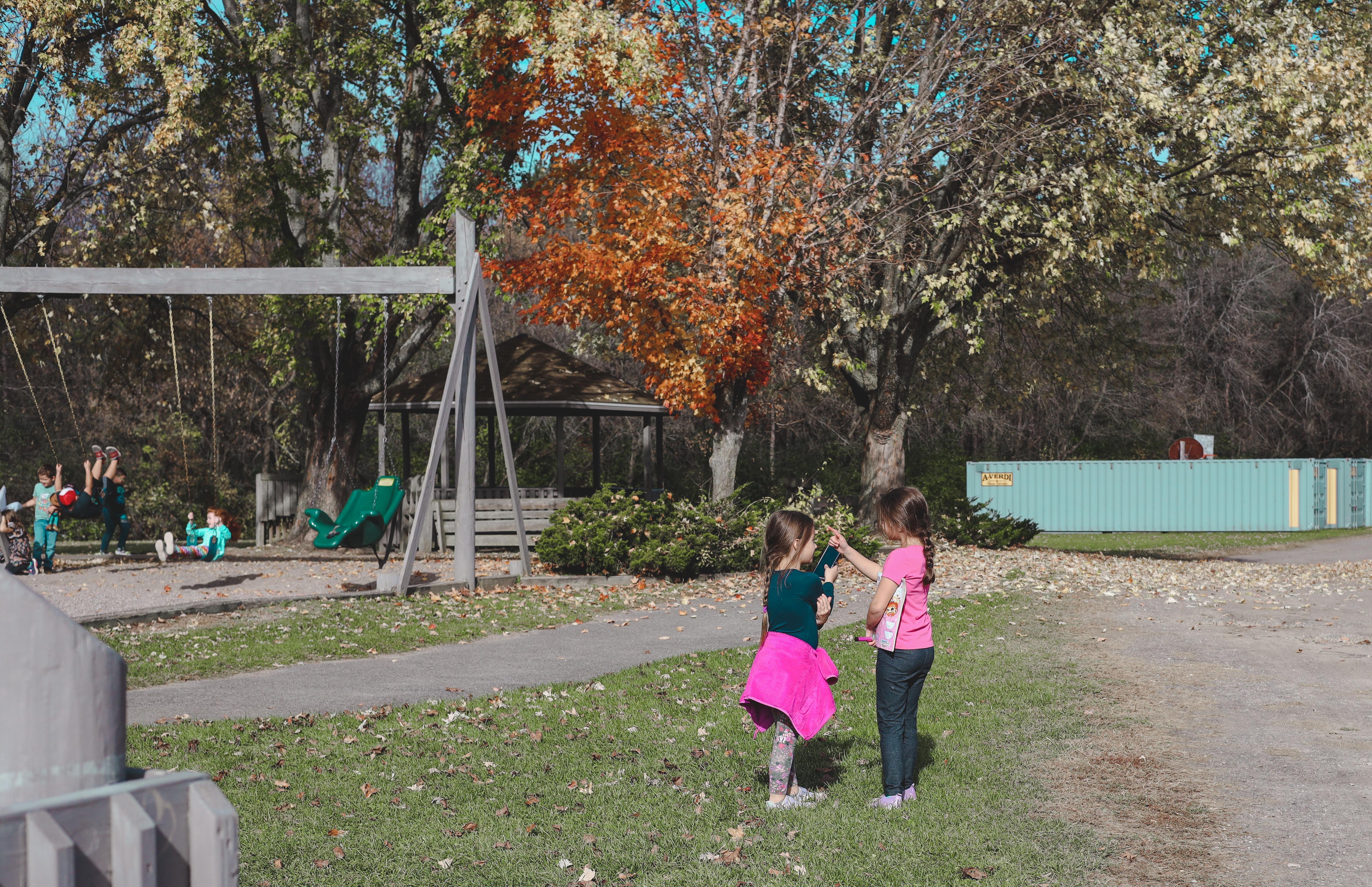 girls paying outside