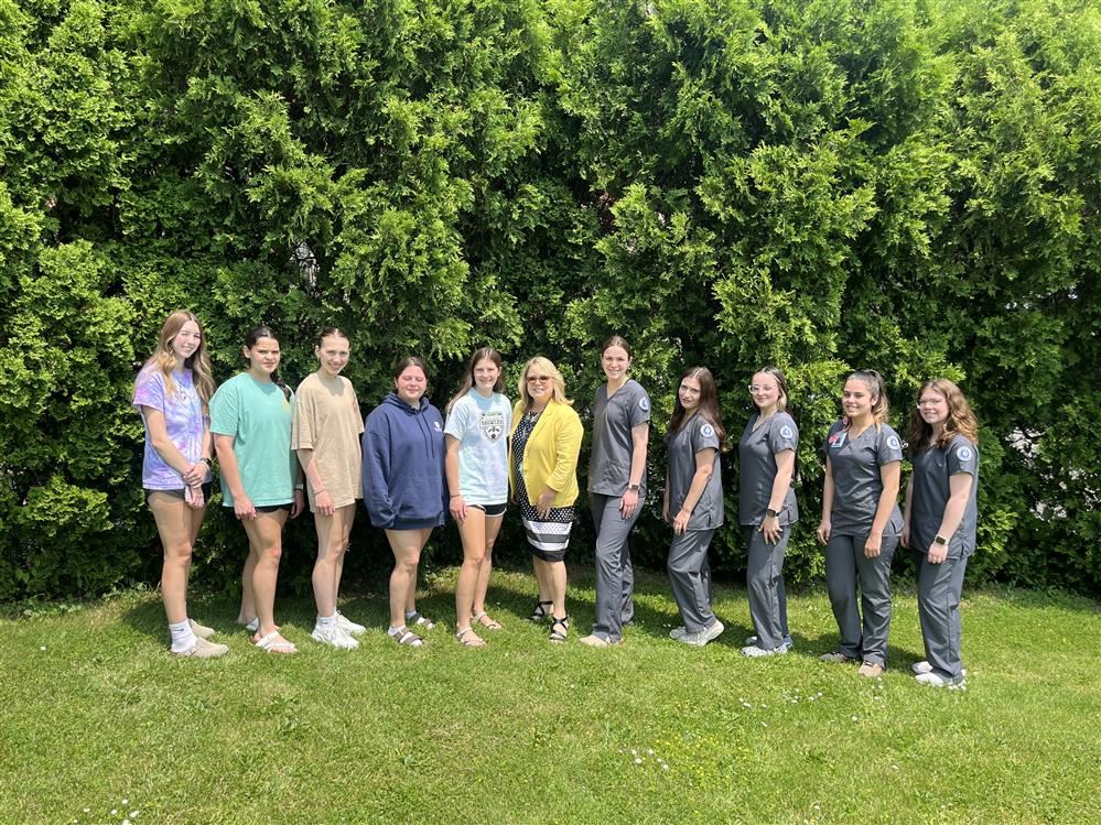  Students posing in their scrubs 