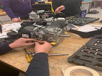 Students working on an engine