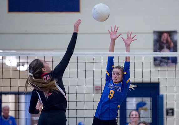 volleyball action at the net