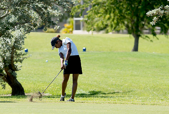 golfers on the course