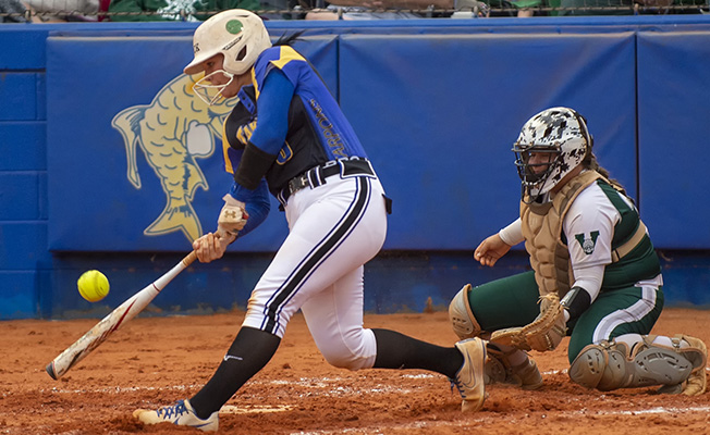 softball athlete at bat