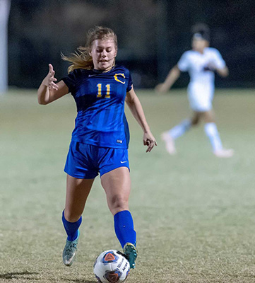 girls soccer action shot