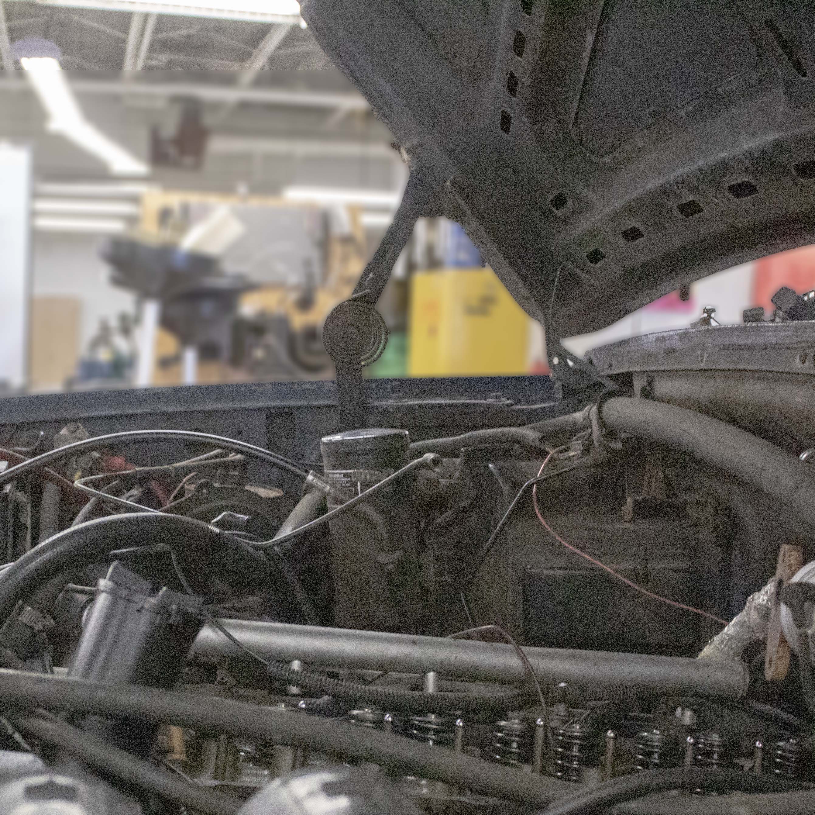 open hood on car in the auto shop at CTC