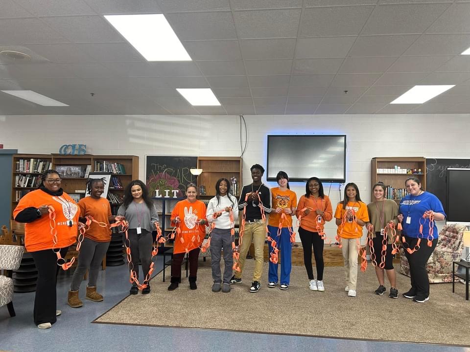 High School Students with Paper Chain