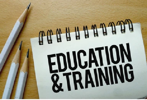 Notepad with Education & Training typed on it