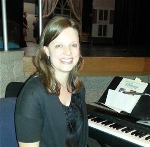 Mrs. Rutherford at the keyboard Mrs. Rutherford at the keyboard