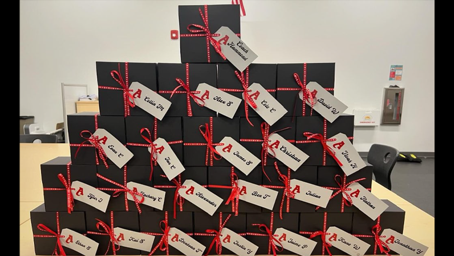 A stack of small ring boxes