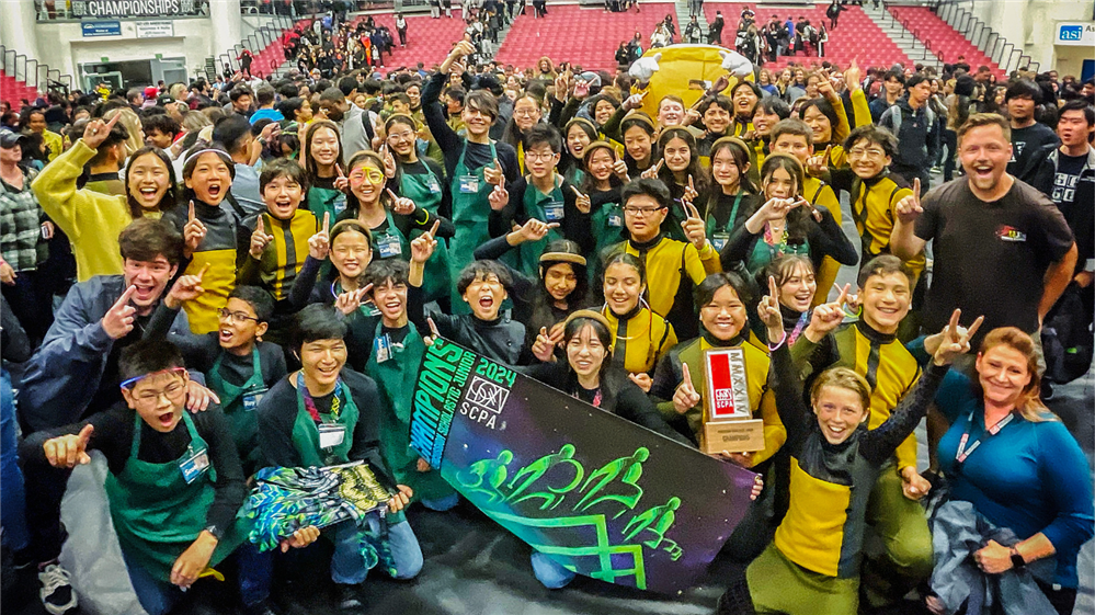  The Townsend drumline ensemble celebrating their gold medal win