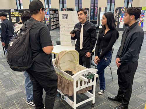 Students showcasing their engineering projects