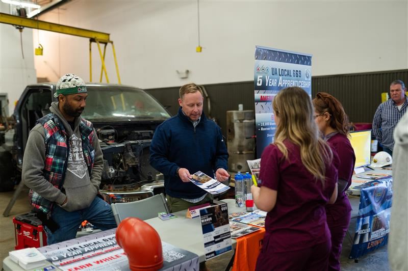 Students interacting with industry representatives at the Union Trades Expo
