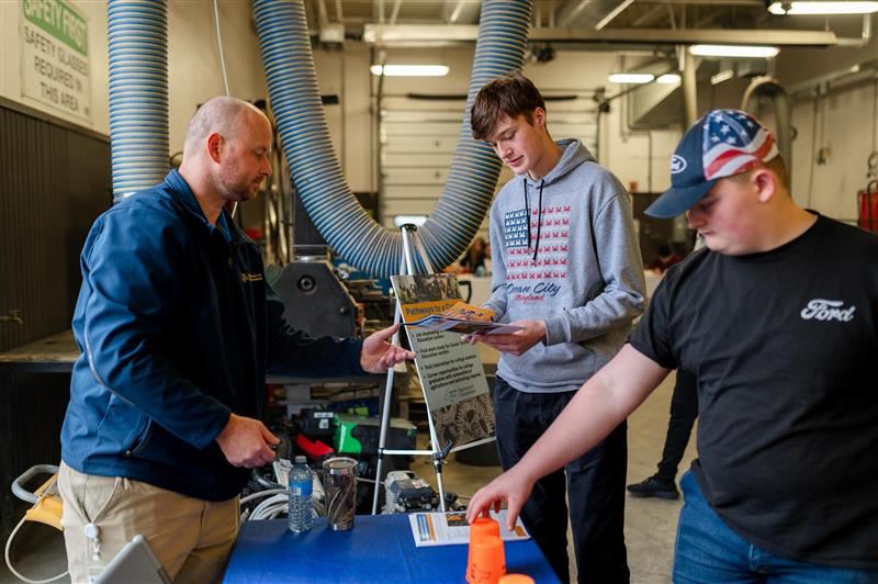 Students interacting with industry representatives at the Union Trades Expo