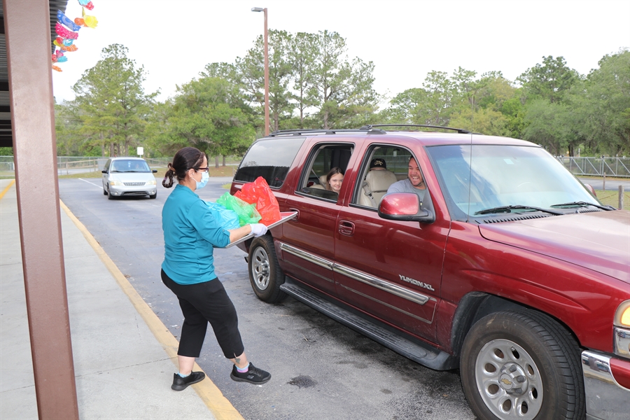 paper bag and student for summer feeding