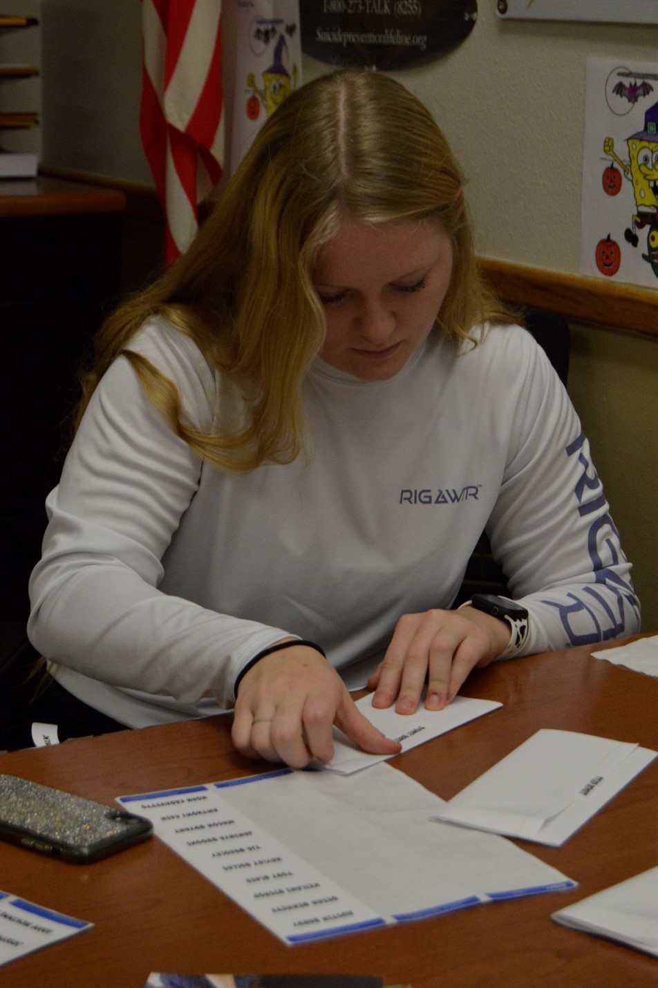 Student labeling documents for staff at CHS as a peer counselor.