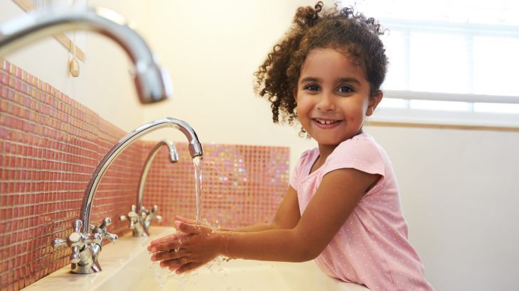 girl washing hands 