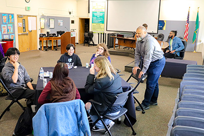 Give 6 Superintendent Ron Banner talking to children