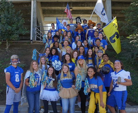 Students in spirit wear at the stadium