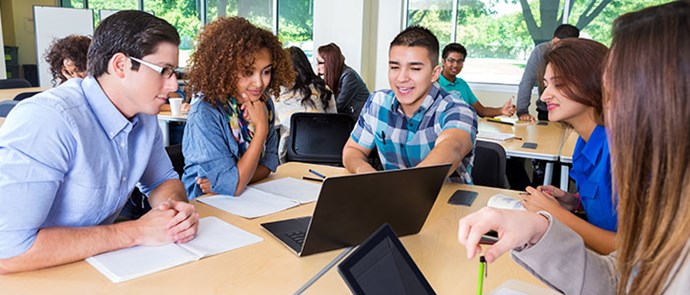 students around a computer