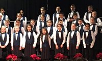 Photo of FW Choir performing at the Winter Holiday Program.