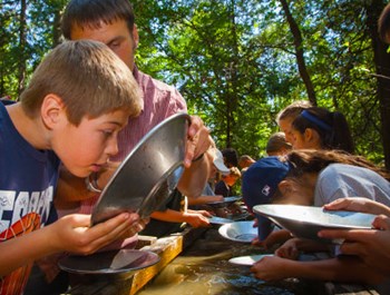 Children panning for gold