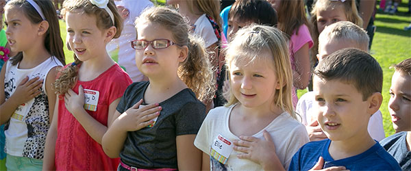 Students doing the pledge of allegiance