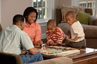 Family of Four Playing Games