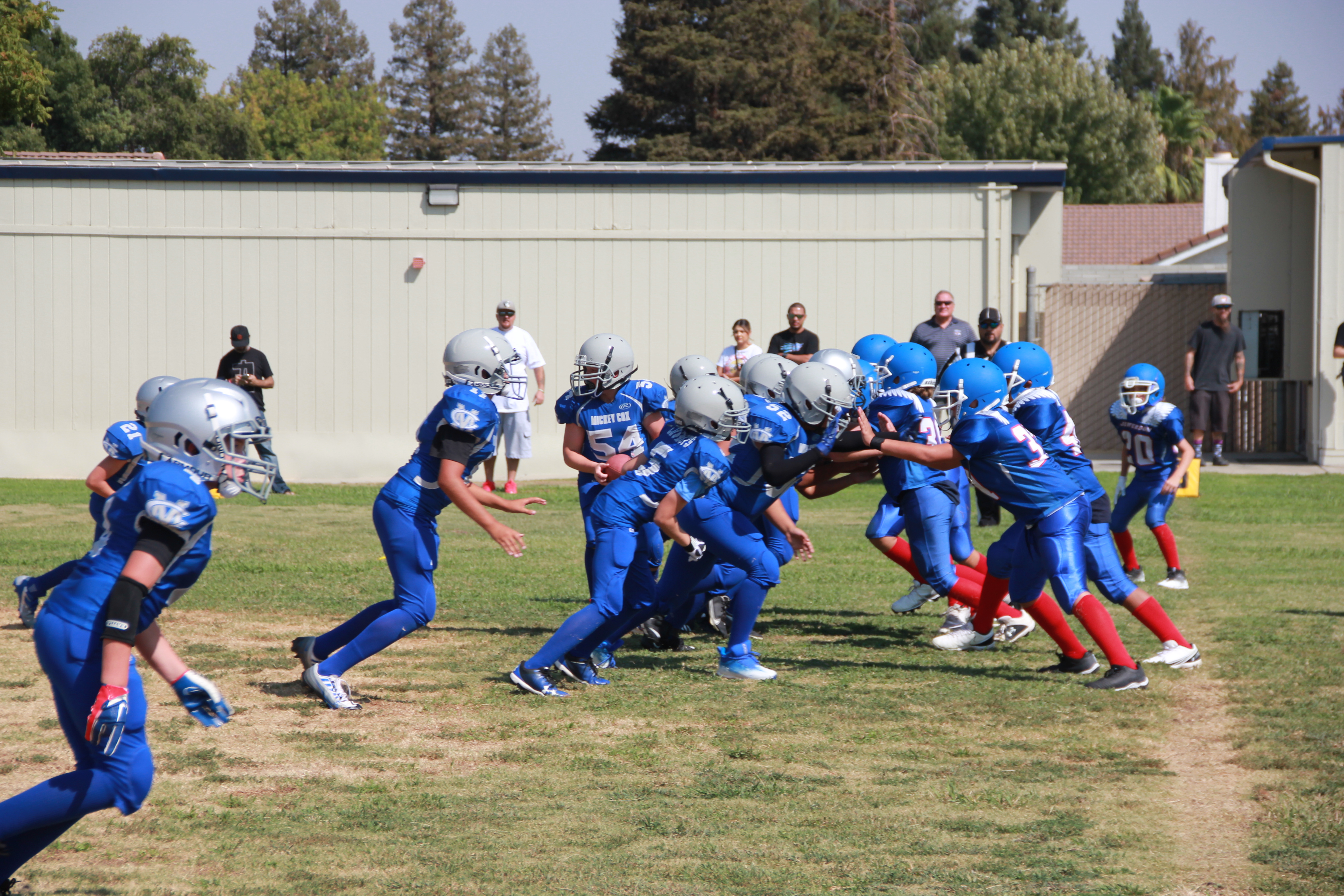 boys playing football