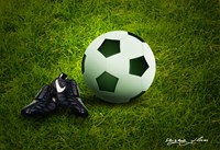 picture of soccer ball and cleats