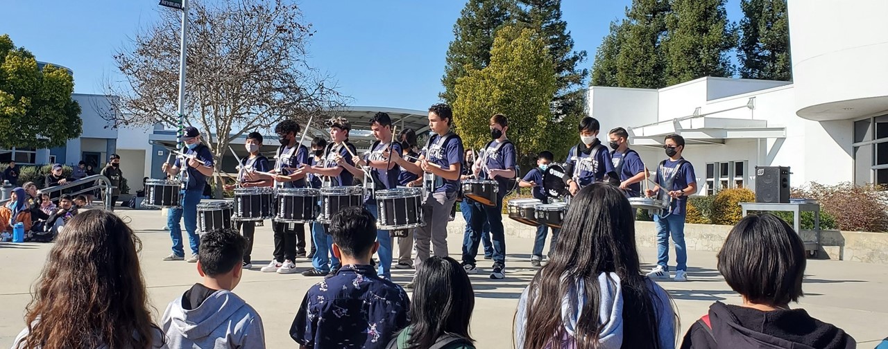 Drum line performing at lunch